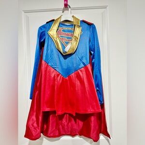 Girls superwomen costume. Worn 1x. Size medium. Comes with dress,cape,belt.